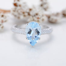 Load image into Gallery viewer, 4 Carat Pear Cut Aquamarine Hidden Halo Gold Engagement Ring