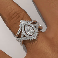 Load image into Gallery viewer, Pear Moissanite Halo Twisted Engagement Ring