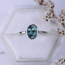 Load image into Gallery viewer, 3 Carat Oval Teal Sapphire Bezel Set Gold Engagement Ring