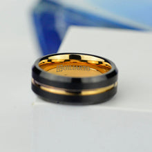 Load image into Gallery viewer, Brushed jet black tungsten band, brilliant 14K gold plating, polished beveled edges, gold center groove, and comfort fit sizing Comes with Free GIFT! MADE IN USA. GILIARTO BRANDED DESIGN- ALL RIGHT RESERVED. Please note, this is a genuine Abalone Shell ring, and has a higher cost than similar copy rings with paper print on Amazon and eBay. Usually this ring gets delivered in up to 3 days in USA.