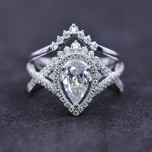 Load image into Gallery viewer, 14K White Gold 1 Carat Pear Moissanite Halo Twisted Engagement Ring Eternity Ring Set
