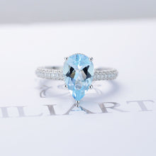 Load image into Gallery viewer, 4 Carat Pear Cut Aquamarine Hidden Halo Gold Engagement Ring