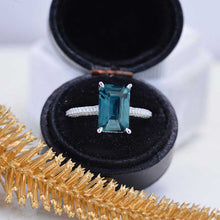 Load image into Gallery viewer, 4ct Emerald Cut Teal Sapphire Engagement Ring