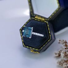 Load image into Gallery viewer, 3 Carat Emerald Cut Teal Sapphire Hidden Halo Engagement Ring