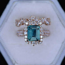 Load image into Gallery viewer, 3Ct Teal Sapphire Engagement Ring. Halo Emerald Cut Teal Sapphire 14K Rose Gold Engagement Ring Set