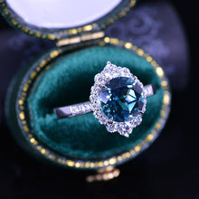 Load image into Gallery viewer, 3 Carat Round Teal Sapphire Halo Gold Engagement Ring