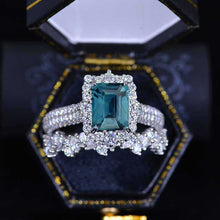 Load image into Gallery viewer, 3Ct Teal Sapphire Engagement Ring Halo Emerald Cut Teal Sapphire Engagement Ring, 9x7mm Step Cut Teal Sapphire Engagement Ring with Eternity Band