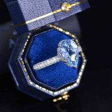 Load image into Gallery viewer, 4 Carat Pear Cut Aquamarine Hidden Halo Gold Engagement Ring