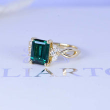 Load image into Gallery viewer, 3 Carat Emerald Cut Emerald Stone Twisted Shank Engagement Ring
