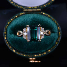 Load image into Gallery viewer, 3 Carat Emerald Cut Emerald Stone Twisted Shank Engagement Ring