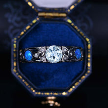 Load image into Gallery viewer, 6mm Round Aquamarine Blue Opal Celtic Engagement Ring 14K Black Gold