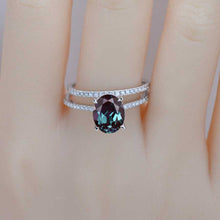 Load image into Gallery viewer, 3 Carat Oval Alexandrite Hidden Halo Engagement Ring Set