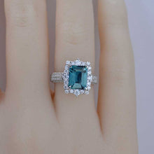 Load image into Gallery viewer, 3Ct Teal Sapphire Engagement Ring Halo Emerald Step Cut Teal Sapphire Engagement Ring
