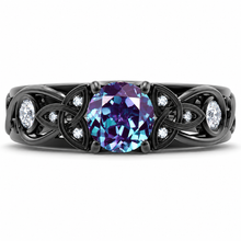 Load image into Gallery viewer, Enhanced front product render of the 6mm lab-grown alexandrite Celtic ring with black rhodium finish