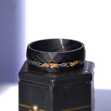 Load image into Gallery viewer, Damascus Steel Ring  with Gold And Silver Foils and Chips Inlay.
