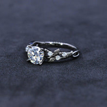 Load image into Gallery viewer, Round Brilliant Cut Moissanite Floral Black Gold Engagement Ring
