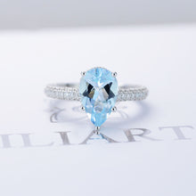 Load image into Gallery viewer, 4 Carat Pear Cut Aquamarine Hidden Halo Gold Engagement Ring
