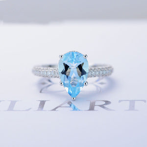 4 Carat Pear Cut Aquamarine Hidden Halo Gold Engagement Ring