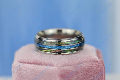 BLUE OPAL: Center blue opal inlay, makes the ring brilliant and beautiful.  ABALONE SHELL: Abalone Shells on outer edges that have clear texture and shiny finish.  Usually(free shipping) this ring gets delivered in up to 2-5 days in USA.
