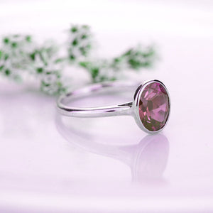 3 Carat Oval Pink Sapphire Bezel Set Engagement Ring